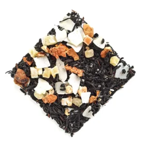 banana cream pie black tea, loose black tea leaves blended with various fruit pieces and coconut slices gathered on a white background